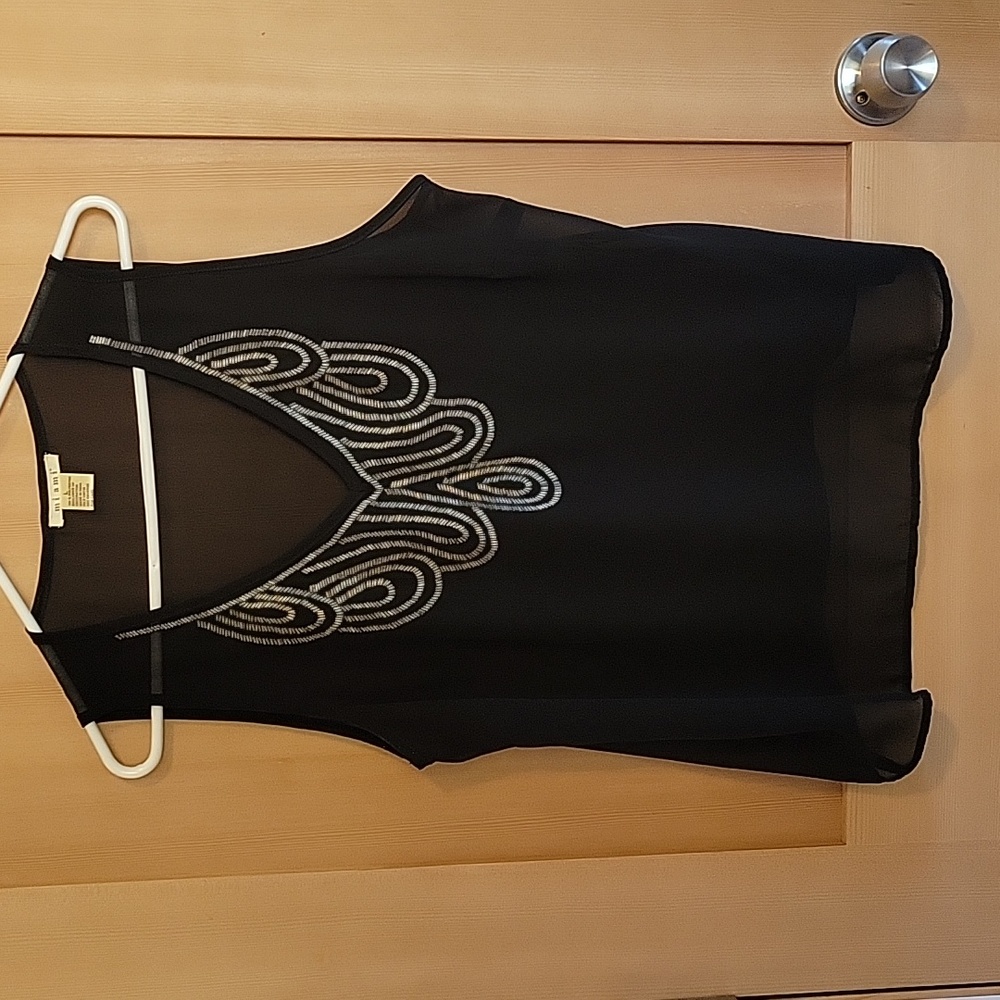 Sheer sleeveless blouse with silver beaded design